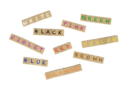 the colors written on colored wooden tiles