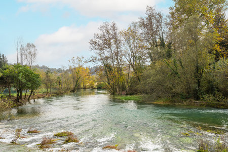 view of the source of the Serenissima, one of the sources of the Livenza River in Polcenigo, Italyの写真素材