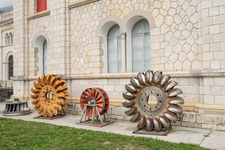 Montereale Valcellina, Italy. November 9 2023. the tangential turbine outside the former Antonio Pitter hydroelectric power station. In operation from 1905 to 1988, in 2006 it was renovated and used as an exhibition and museum venue.のeditorial素材