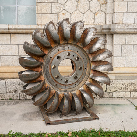 Montereale Valcellina, Italy. November 9 2023. the tangential turbine outside the former Antonio Pitter hydroelectric power station. In operation from 1905 to 1988, in 2006 it was renovated and used as an exhibition and museum venue.のeditorial素材