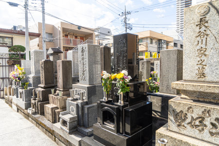 Tokyo, Japan. January 2024. Interior view of graves in a small cemetery in the city centerのeditorial素材
