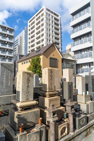 Tokyo, Japan. January 2024. Interior view of graves in a small cemetery in the city centerのeditorial素材
