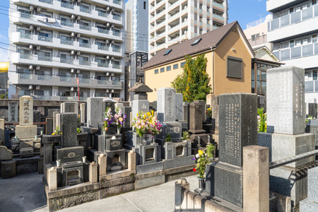 Tokyo, Japan. January 2024. Interior view of graves in a small cemetery in the city centerのeditorial素材