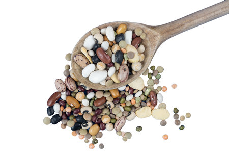 Dried Legumes mixed on a wooden spoon