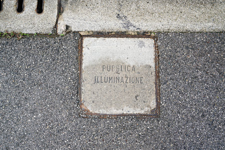 Tresigallo (FE) October 5, 2025. the manhole of the public lighting in a street in the city centerの写真素材