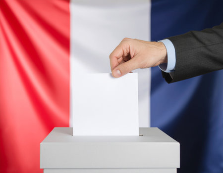 AI generated image. A voter inserts the ballot paper into the ballot box, with the French flag in the backgroundの素材