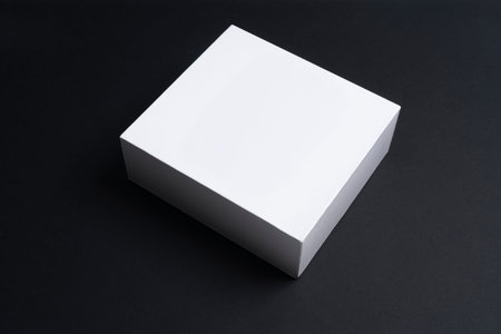 a white box on a black surfaceの写真素材