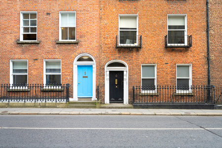 Dublin, Ireland. April 7, 2026. typical colored entrance door of a house in a classic building in the city center