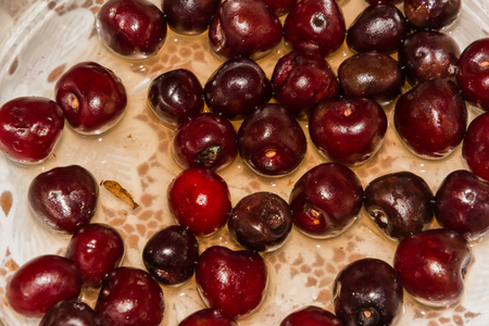 cooking cherry jamの写真素材