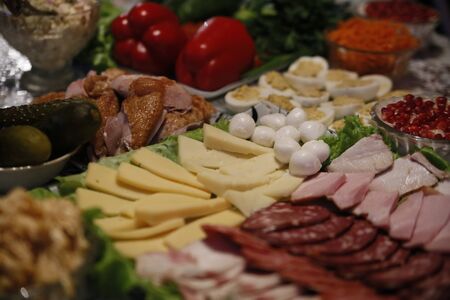 Festive table with a variety of delicious foodの写真素材