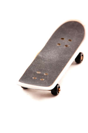 the toy roller board was photographed on a white backgroundの写真素材