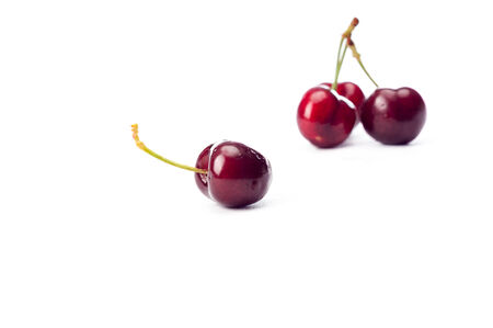 beautiful ripe sweet cherry was photographed on a white backgroundの写真素材