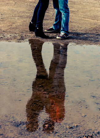 Beautiful loving young couple was photographed on a walkの写真素材