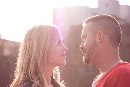 Beautiful loving young couple was photographed on a walkの写真素材