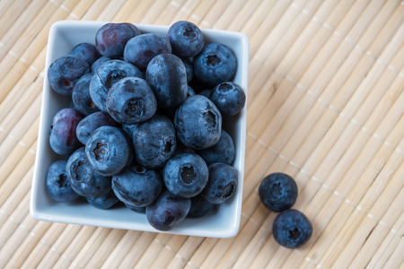 fresh blueberry was beautiful is photographed in a plate in studioの写真素材