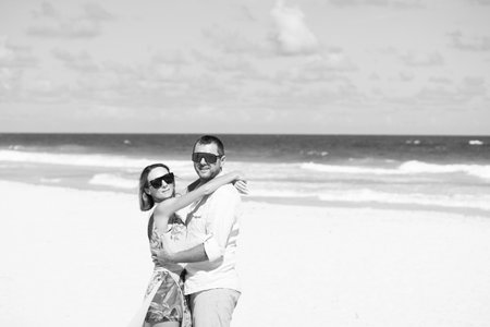 Beautiful people on a beautiful beachの写真素材