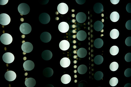 abstract background with bokeh defocused lights and shadow.の写真素材