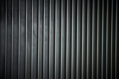 Corrugated metal texture for background. Dark edged. Toned.の写真素材