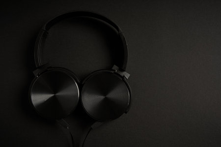 black headphones on a black backgroundの写真素材