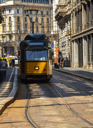 Tram on an old street in Milan, Italyの写真素材