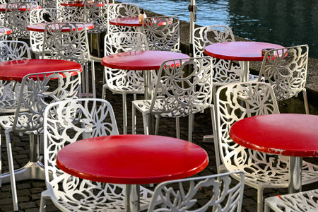 empty bar tables and sits by the limmat river in Zurich, Switzerlandの写真素材