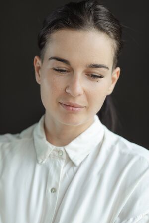portrait of gorgeous brunette in white shirt with perfect skin. fashion young woman indoor with...
