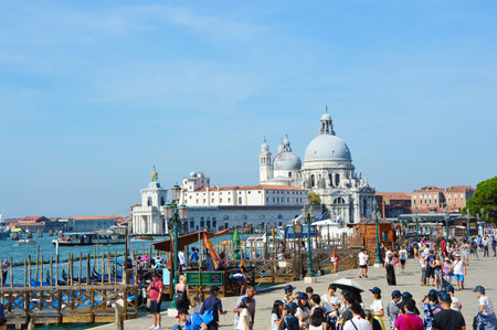 Venice view of the Grand Canal and Basilica of Saint Mary of Health, with japaneses tourists, Venice, Italy summer 2016のeditorial素材