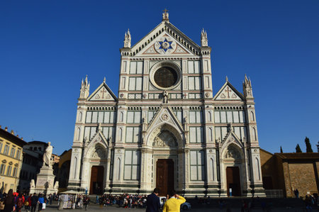 Unidentified persons visit the Basilica di Santa Croce in Piazza Santa Croce square, Florence, Italyのeditorial素材