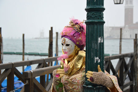 Masked participant in The Carnival of Venice, an annual festival that starts around two weeks before Ash Wednesday and ends on Mardi Gras on February 23, 2017 in Venice, Italy.のeditorial素材