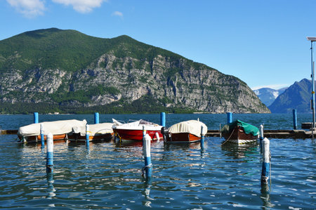 ISEO, ITALY - MAY 13, 2017: View of harbor of Iseo on Lake Iseo, Lombardy, Italyのeditorial素材