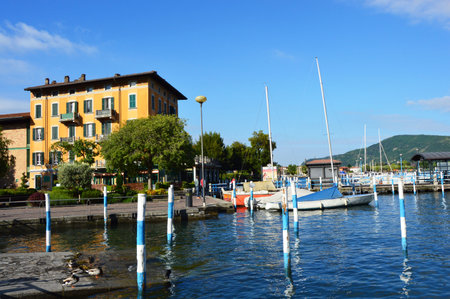 ISEO, ITALY - MAY 13, 2017: View of harbor of Iseo on Lake Iseo, Lombardy, Italyのeditorial素材