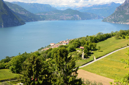 Lake panorama from Monte Isola. Italian landscape. Island on lake. View from the island Monte Isola on Lake Iseo, Italyのeditorial素材