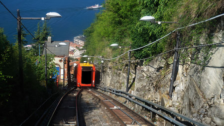BRUNATE, ITALY - MAY 14, 2017: Amazing view of funicular on Lake Como climbing railway to Brunate, Como, Italyのeditorial素材