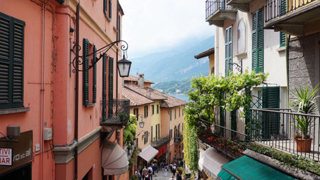 Detail of old scenic streets Salita Serbelloni in Bellagio, picturesque small town street view on Lake Como, Italyのeditorial素材