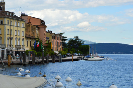 Garda lake front Lungolago Zanardelli with boats moored, Salo, Italyのeditorial素材
