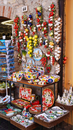 Souvenir shop handmade objects and vintage spices in Sirmione, Lake Garda, Italyのeditorial素材