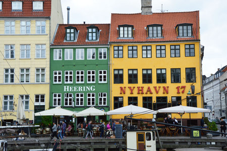 COPENHAGEN, DENMARK - MAY 31, 2017: Nyhavn to 17th century harbor in Copenhagen with typical...