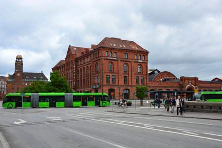 Detail of Central Station Malmo C, Central Railway Station with green articulated bus Ledbuss, Malmo, Swedenのeditorial素材