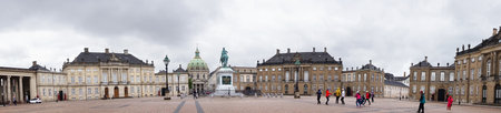 COPENHAGEN, DENMARK - MAY 31, 2017: Amalienborg Slotsplads square with a monumental equestrian statue of Amalienborg's founder, King Frederick V and Frederik's Church on the background, Copenhagenのeditorial素材