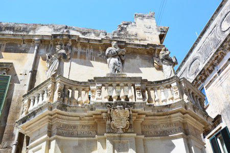 Detail balcony with statues in Piazza del Duomo square, Lecce, Italyのeditorial素材