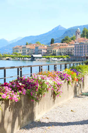 Walk along the Lake Como in Bellagio in summer time, Italyの写真素材