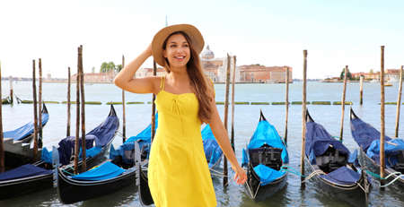 Smiling young tourist woman in Venice, Italyの写真素材