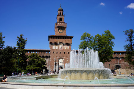 MILAN, ITALY - AUGUST 13, 2022: Sforza Castle square with fountain in Milan, Italyのeditorial素材