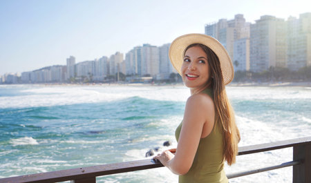 Brazilian girl on promenade viewpoint in Guaruja coastal city of Brazil, South Americaの写真素材