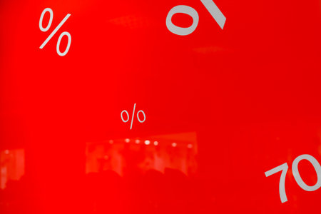 Discount signs on red background shop window in shopping mall. holiday sale conceptの写真素材