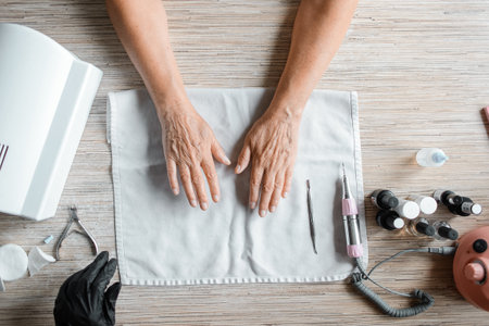 Female hands before the manicure procedure, top viewの写真素材