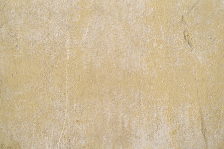 Texture of concrete faded, scratched concrete wall, outside. Natural background with place for text.の写真素材
