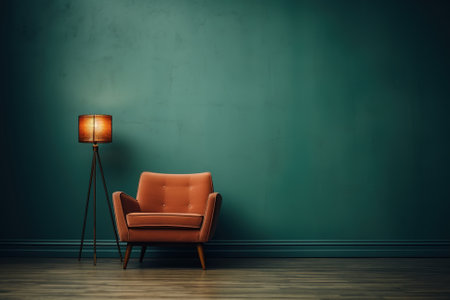 Minimalistic interior design, stylish fabric armchair and a lamp near the blue wall.の素材