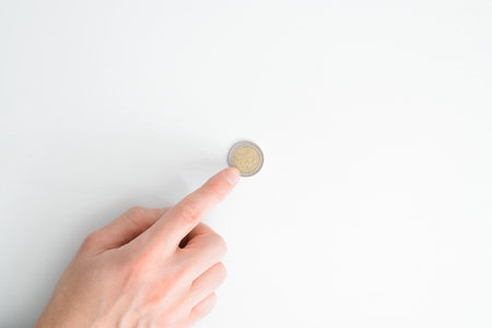 Business concept, financial problems, poverty, poor, crisis. Top view hand counting money on white...
