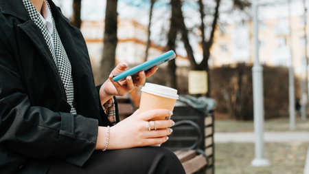People and technology. Close-up of woman using smartphone, chatting on internet on mobile phone...